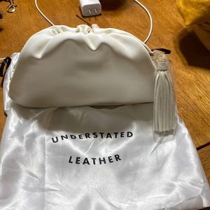 new understated leather clutch
